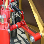 Trailing mounted cranks — allows more flotation of rake wheels